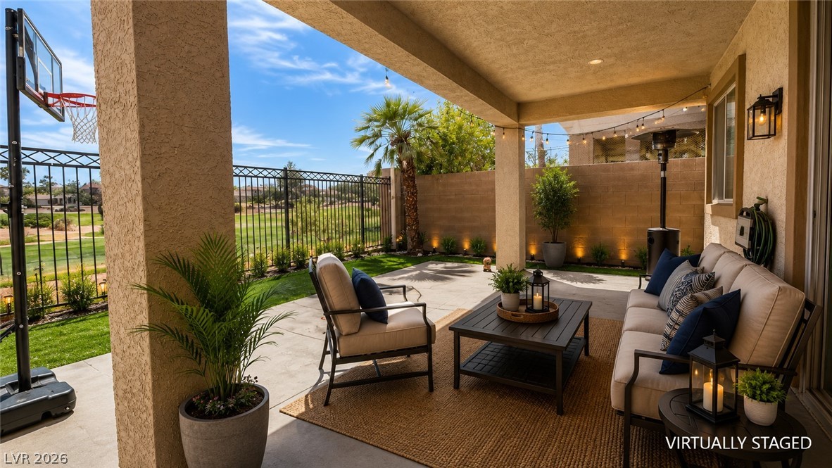 87 Tall Ruff Drive Las Vegas, NV 89148 - Photo 30 of 71 A spacious covered patio provides a delightful outdoor living area with picturesque views of the golf course.