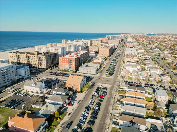 a view of city with ocean