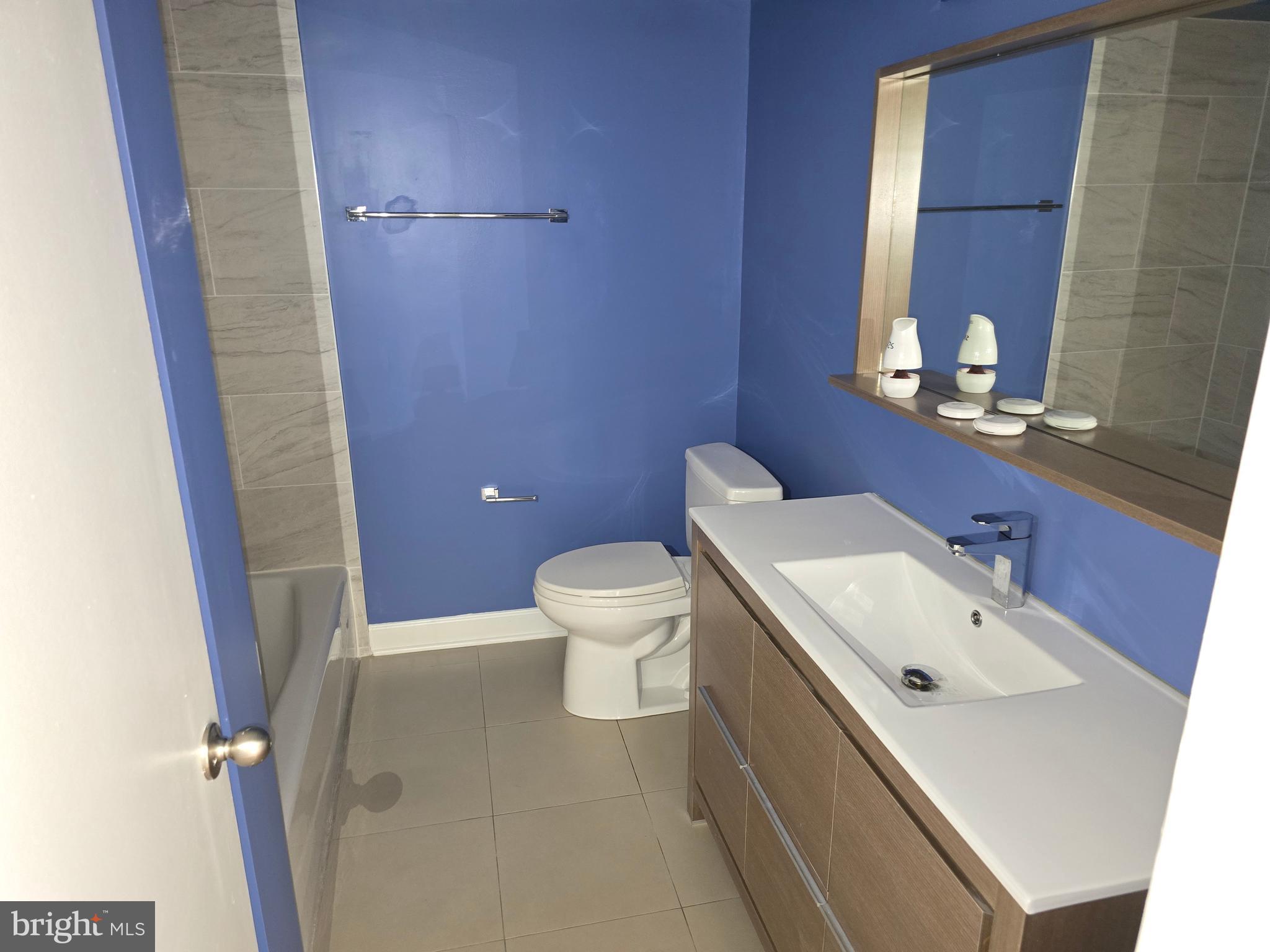 1101 St Paul Street, Unit 1212 Baltimore, MD 21202 - Photo 31 of 31 Hall bath