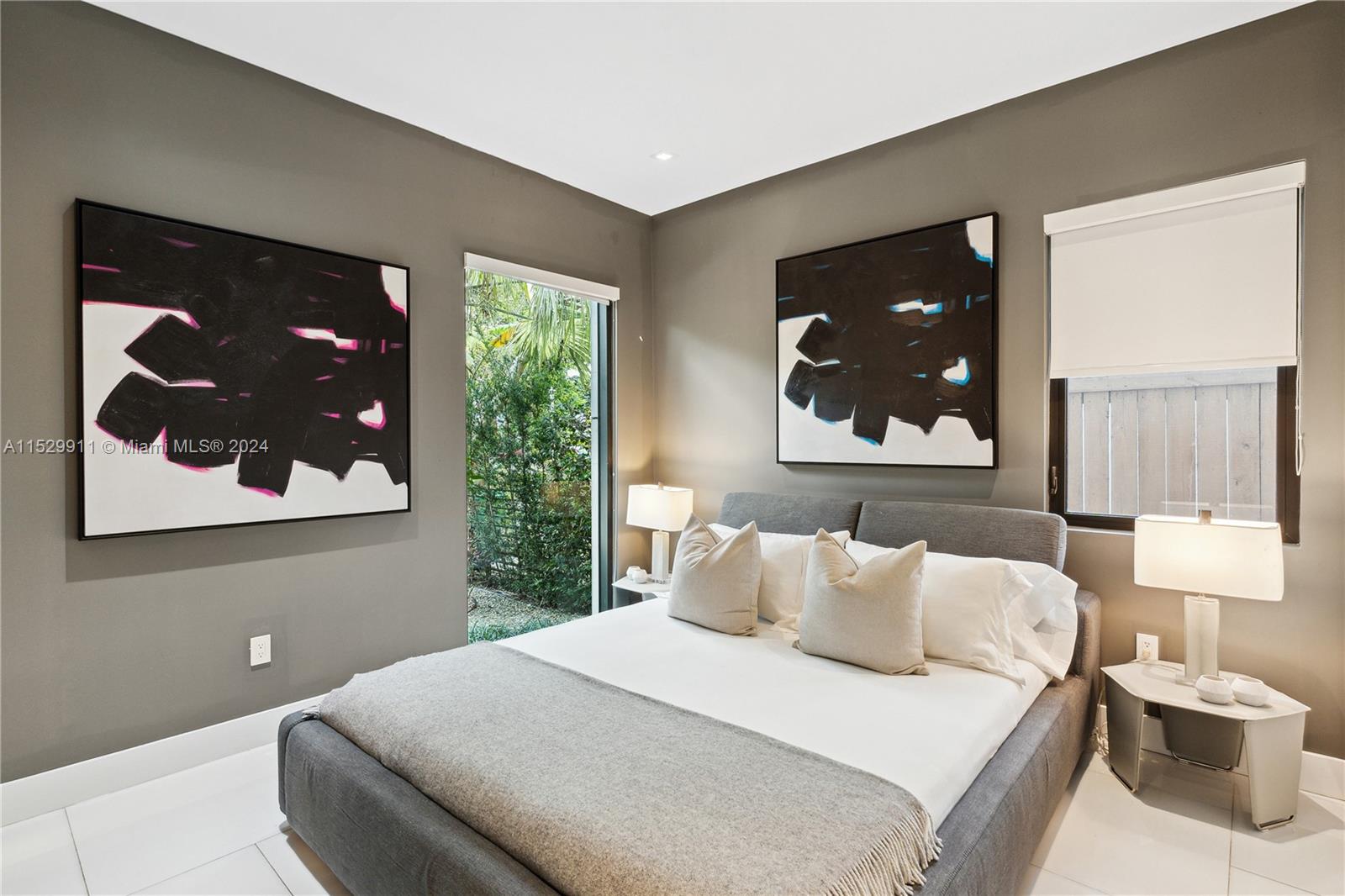 4060 Woodridge Road Miami, FL 33133 - Photo 29 of 49 a bedroom with a bed and window