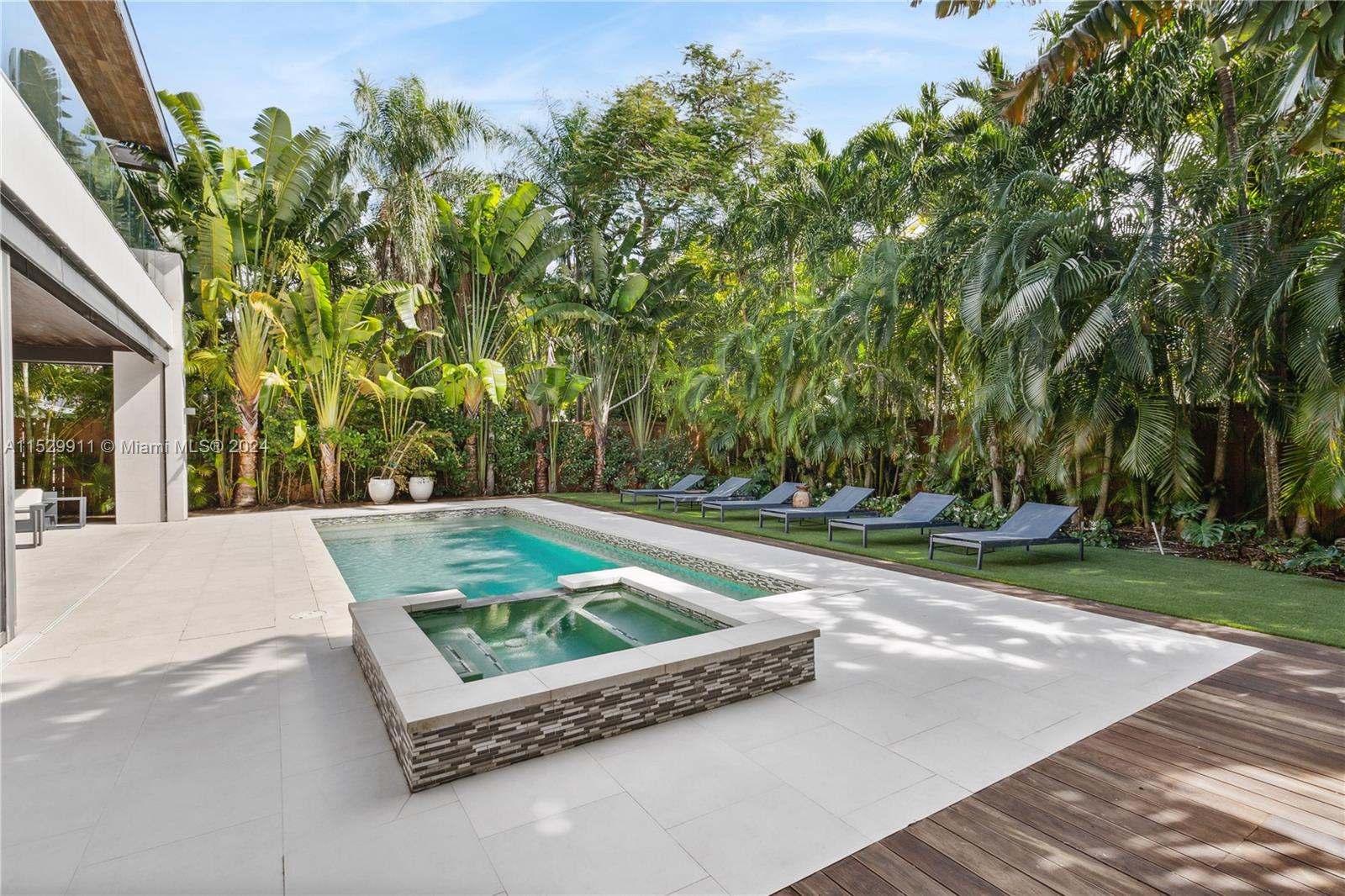 4060 Woodridge Road Miami, FL 33133 - Photo 36 of 49 a view of a yard with plants