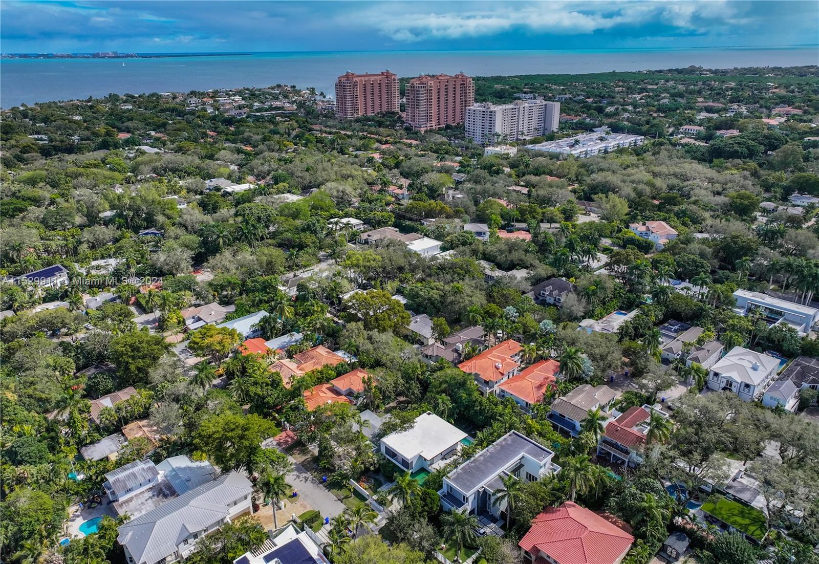 4060 Woodridge Road Miami, FL 33133 - Photo 45 of 49 an aerial view of residential houses with outdoor space and trees