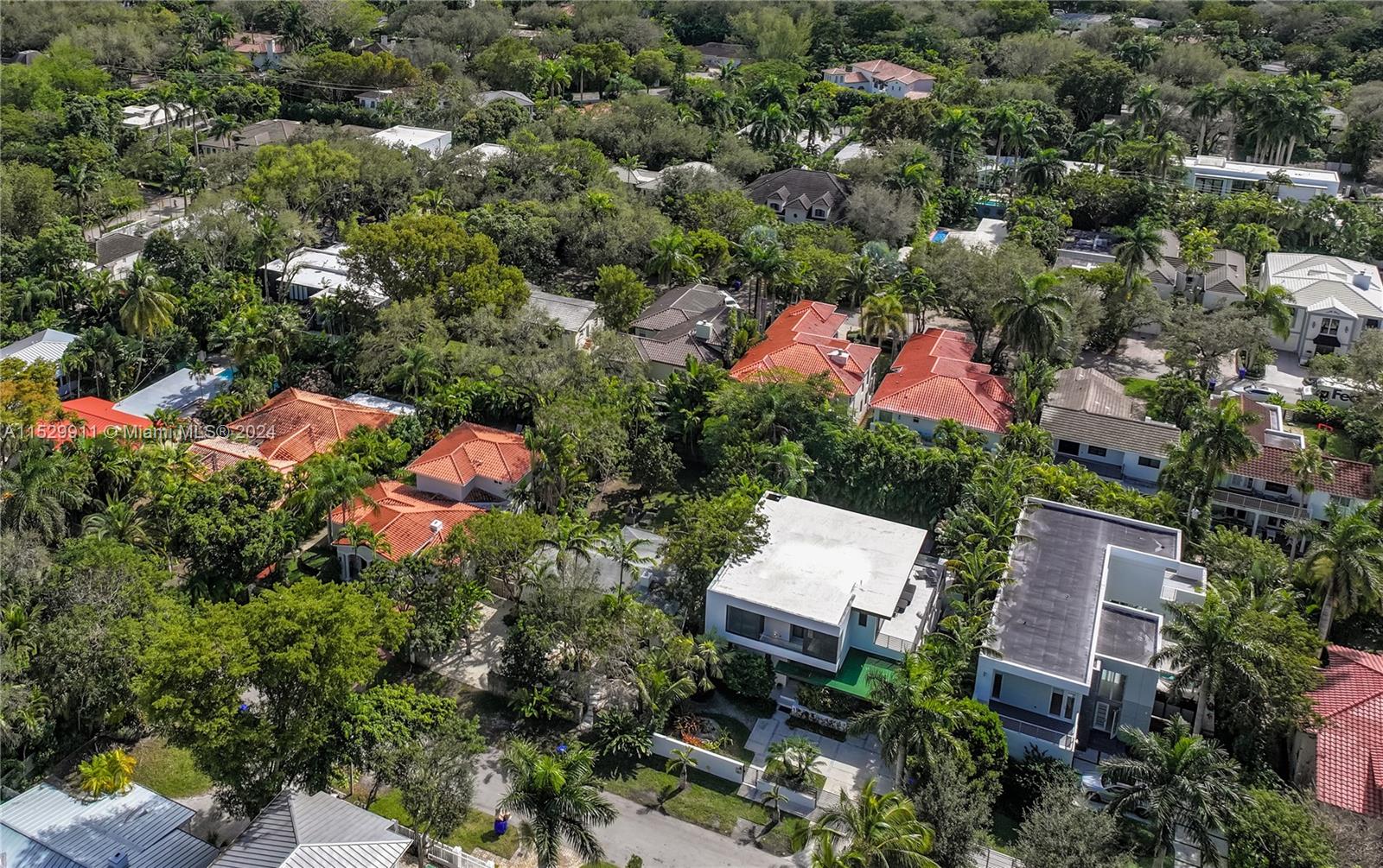 4060 Woodridge Road Miami, FL 33133 - Photo 47 of 49 an aerial view of a house with a yard