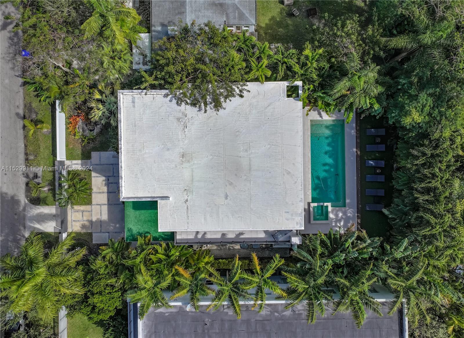 4060 Woodridge Road Miami, FL 33133 - Photo 49 of 49 an outdoor view with patio