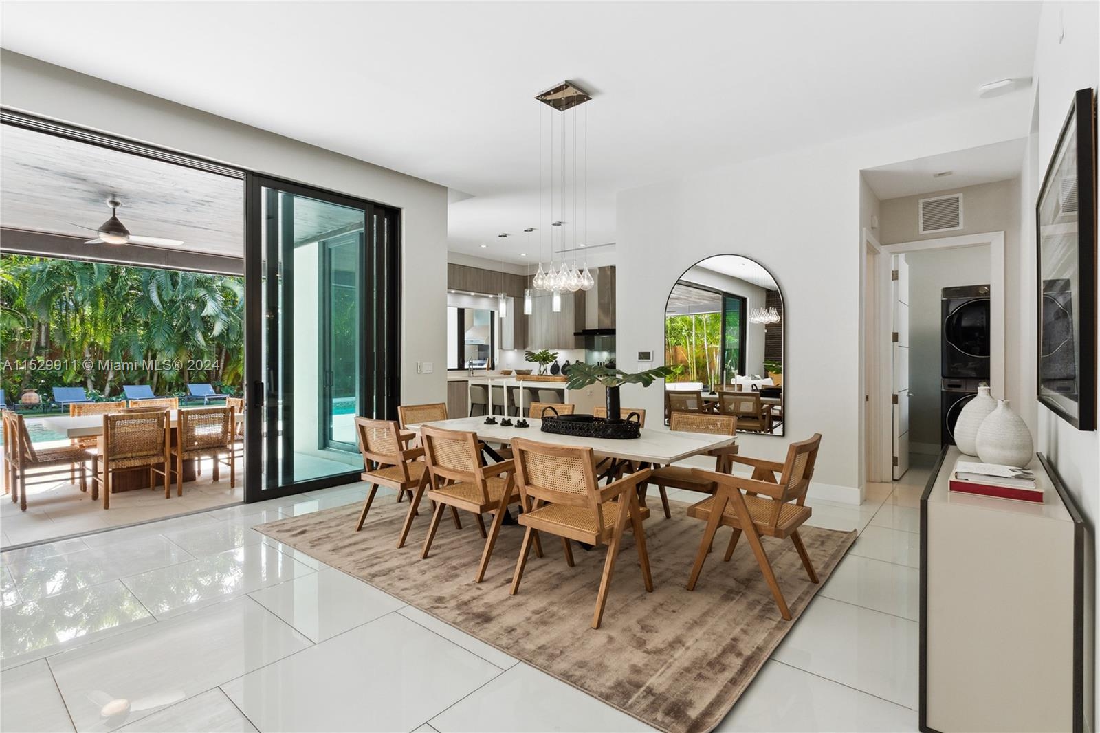 4060 Woodridge Road Miami, FL 33133 - Photo 5 of 49 a view of a dining room with furniture window and outside view