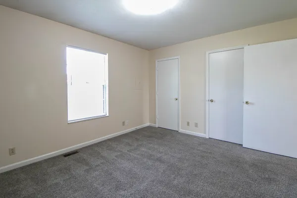 an empty room with windows