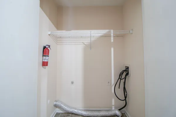 a view of small space with racks on the wall