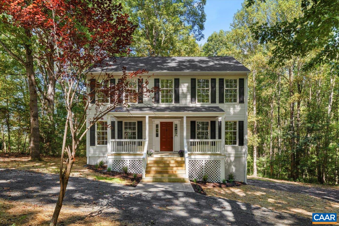 15379 Louisa Road Louisa, VA 23093 - Photo 2 of 45 a front view of a house with a yard