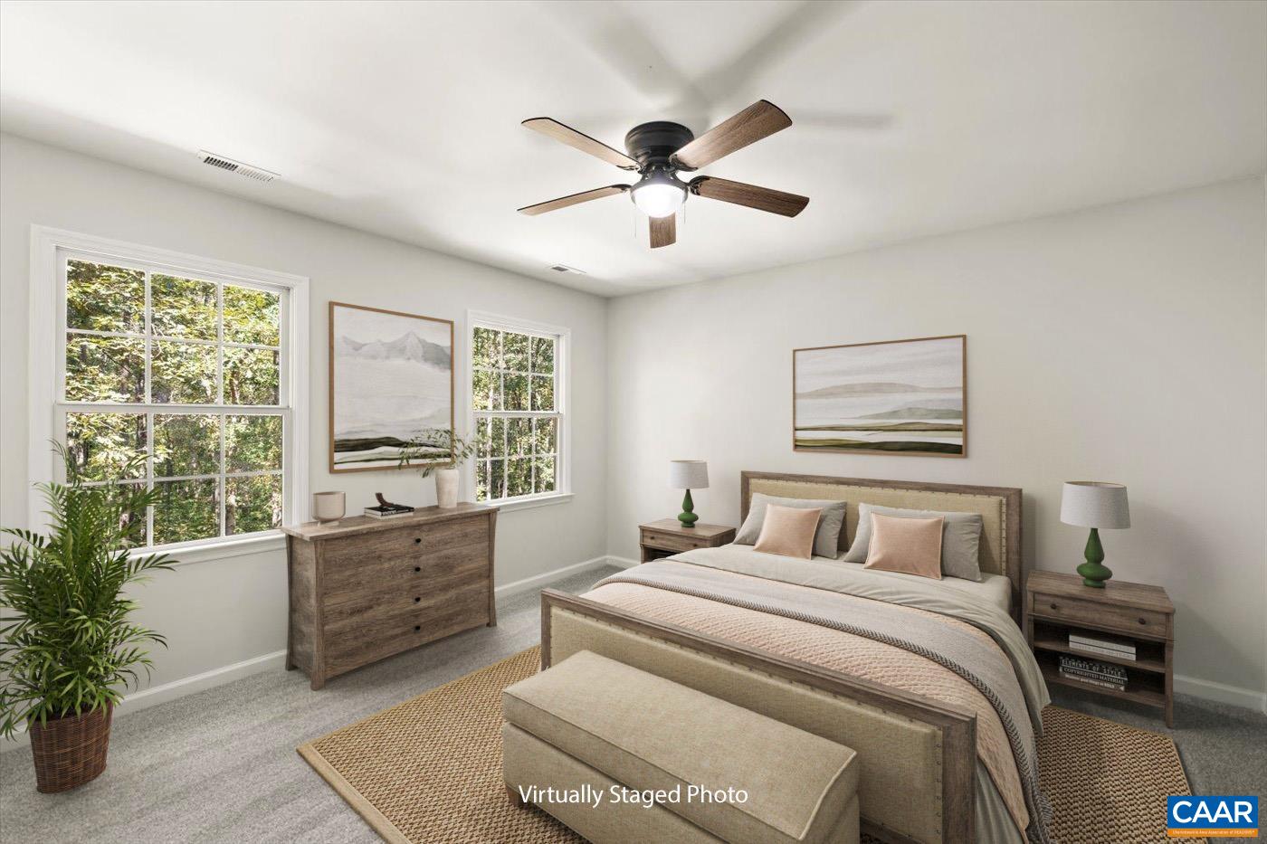 15379 Louisa Road Louisa, VA 23093 - Photo 22 of 45 a bedroom with a large bed and a window