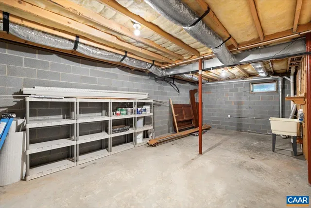 a view of an empty room with windows