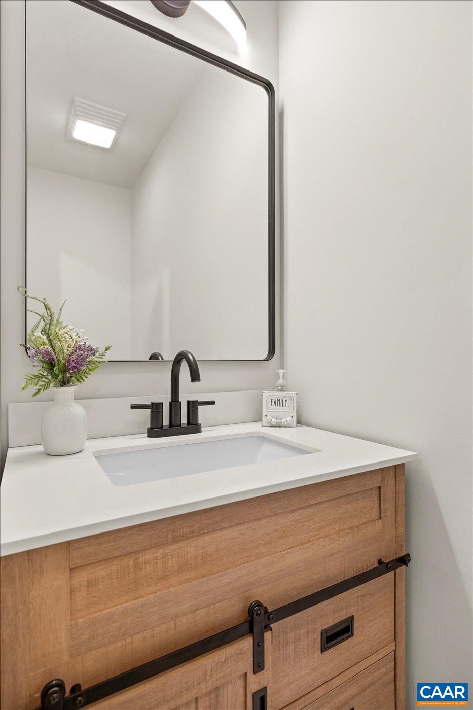15379 Louisa Road Louisa, VA 23093 - Photo 7 of 45 a bathroom with a sink and a mirror