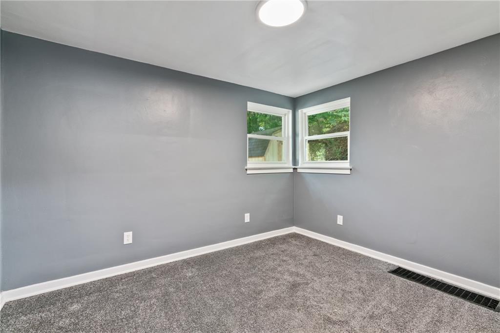 629 Beulah Road Pittsburgh, PA 15235 - Photo 9 of 26 an empty room with windows