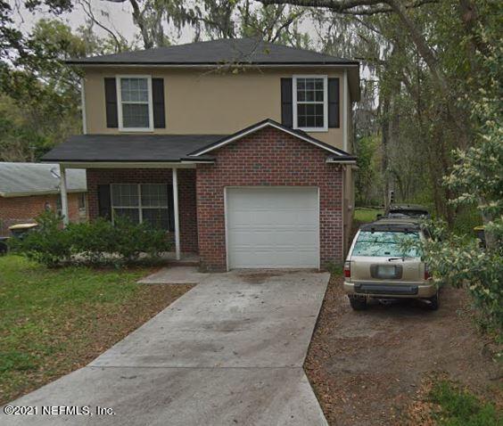 4711 Spring Glen Road Jacksonville, FL 32207 - Photo 1 of 1 a house view with a garden space