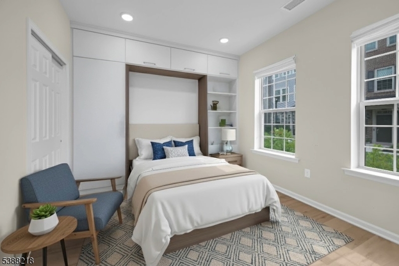 32 Gala Court Livingston, NJ 07039 - Photo 12 of 17 a bedroom with a bed and a chair in it