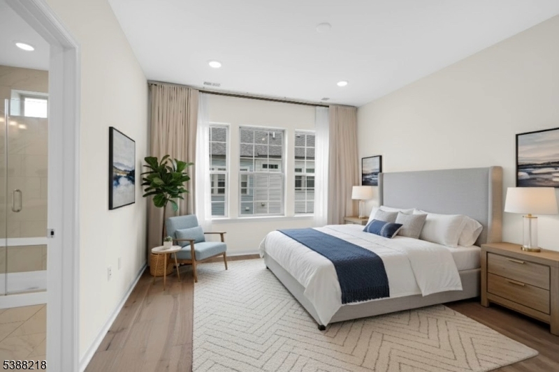 32 Gala Court Livingston, NJ 07039 - Photo 6 of 17 a bedroom with a large bed and a large window