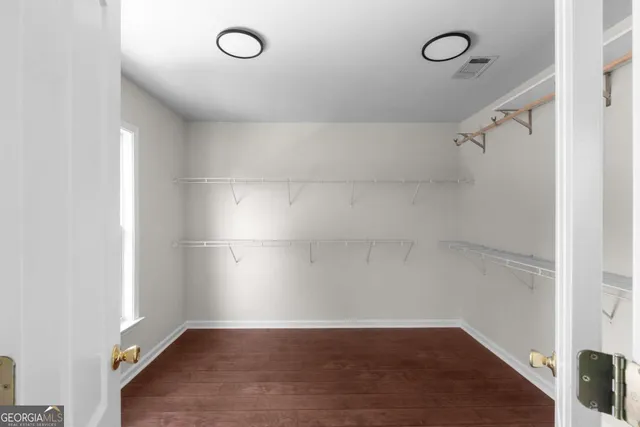 a view of a room with racks on the wall