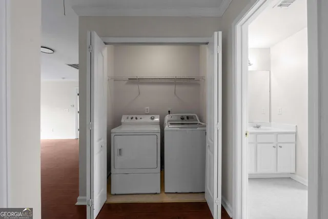 a utility room with dryer and washer