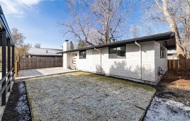 a view of backyard with cabin
