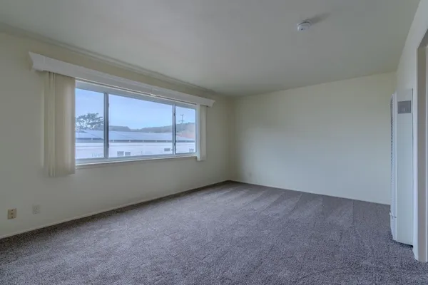 an empty room with a window