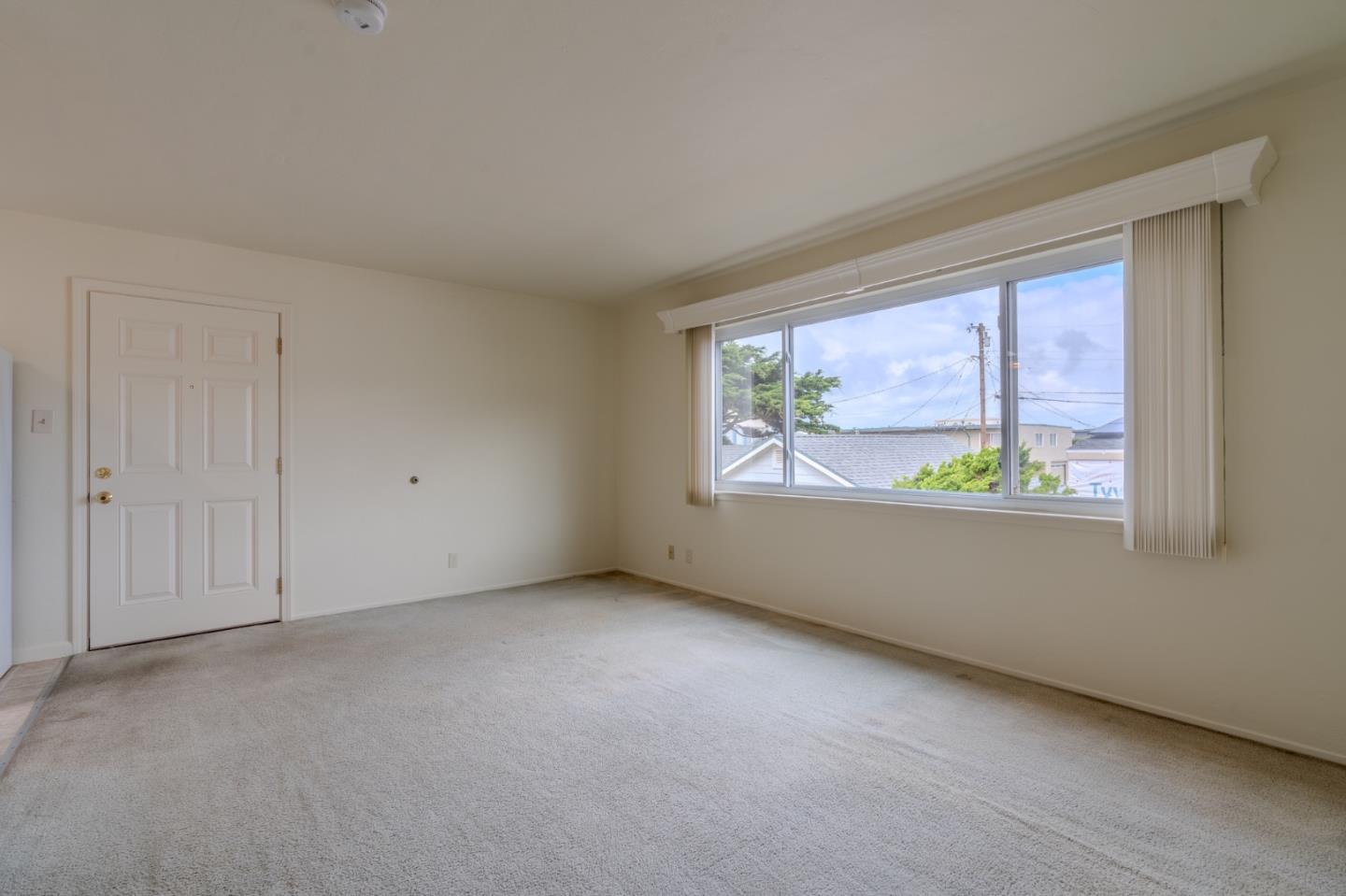 15 Santa Maria Avenue, Unit 3 Pacifica, CA 94044 - Photo 6 of 10 a view of an empty room with a window