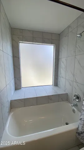 a bathroom with a bathtub