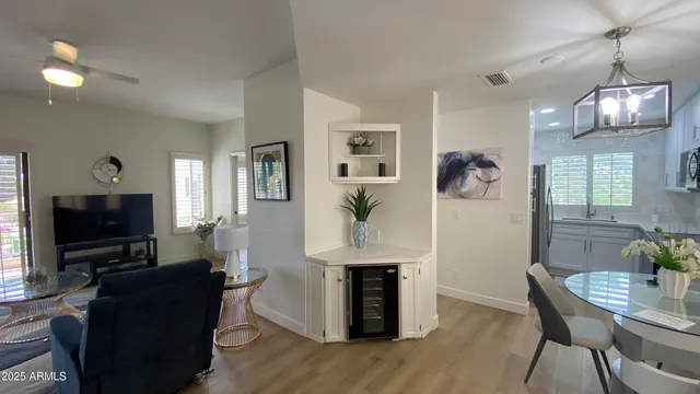 a view of a livingroom with furniture window and wooden floor