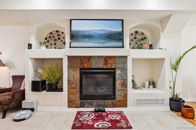 a view of a dining room with furniture wooden floor and chandelier