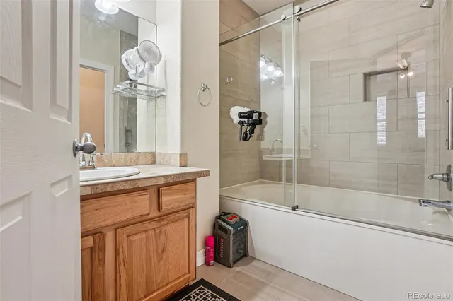 a bed room with a bed and a window