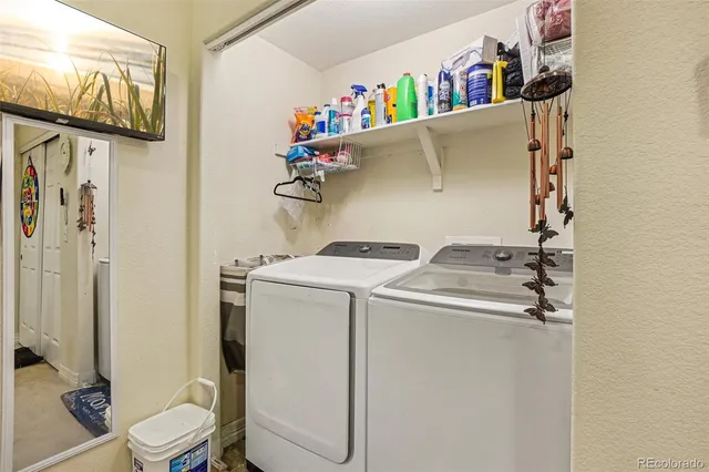 a picture of a wall with a white wall and a picture of a bathroom