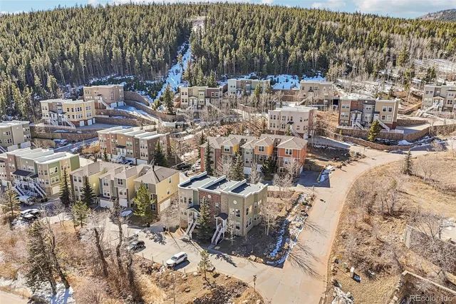 a view of a city with mountains in the background