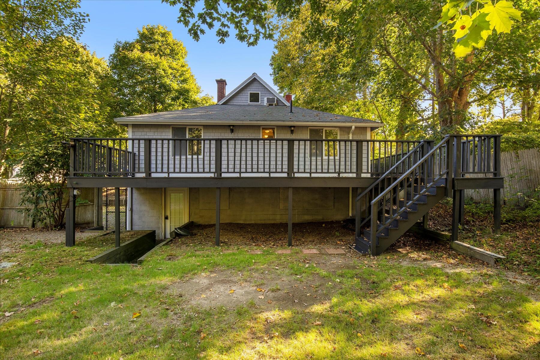 254 Barlows Landing Road Pocasset, MA 02559 - Photo 19 of 27 a view of a house with a yard