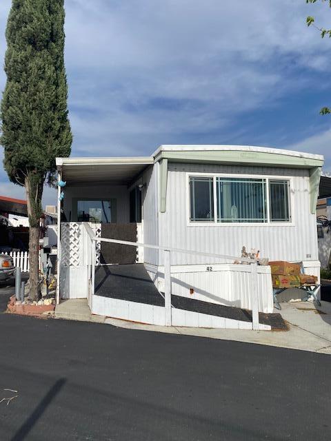 a front view of a house with garage