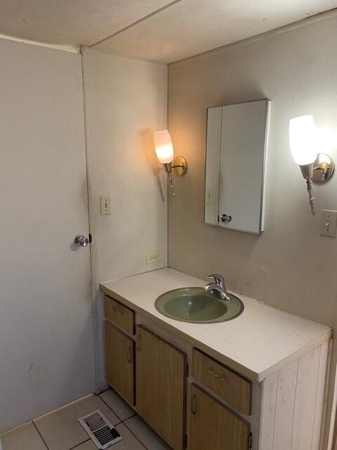 18323 Soledad Canyon Road Santa Clarita, CA 91387 - Photo 6 of 11 a bathroom with a sink and a mirror