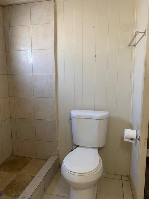 18323 Soledad Canyon Road Santa Clarita, CA 91387 - Photo 7 of 11 a white toilet sitting next to a bathroom sink