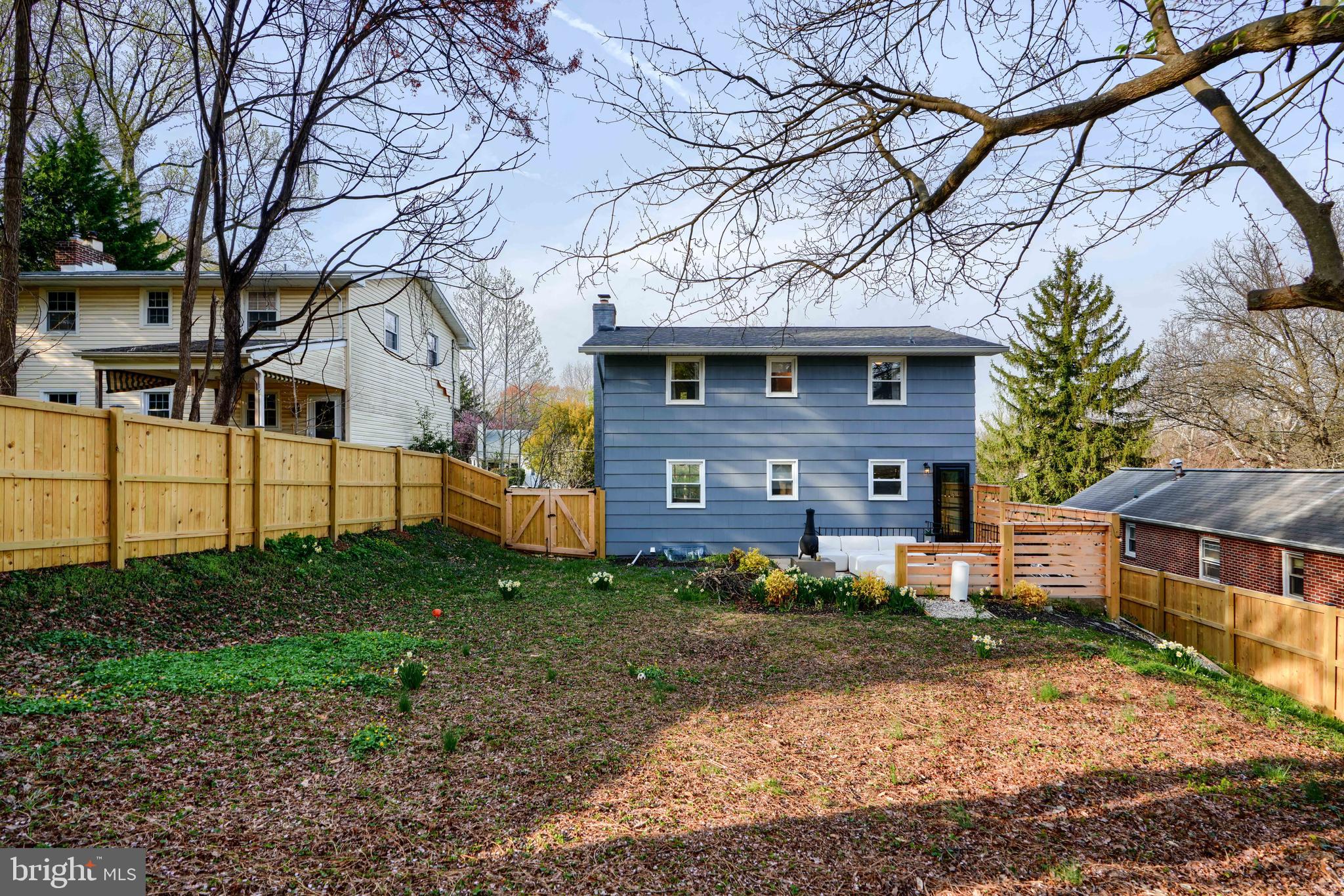 1103 Litchfield Road, Unit H Baltimore, MD 21239 - Photo 11 of 74 a view of a house with a yard