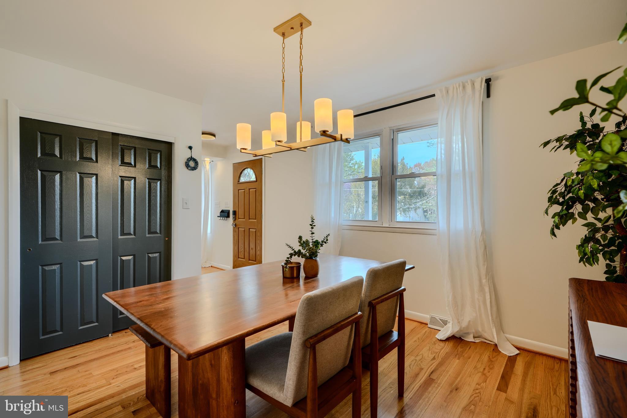1103 Litchfield Road, Unit H Baltimore, MD 21239 - Photo 24 of 74 a dining room with furniture and window