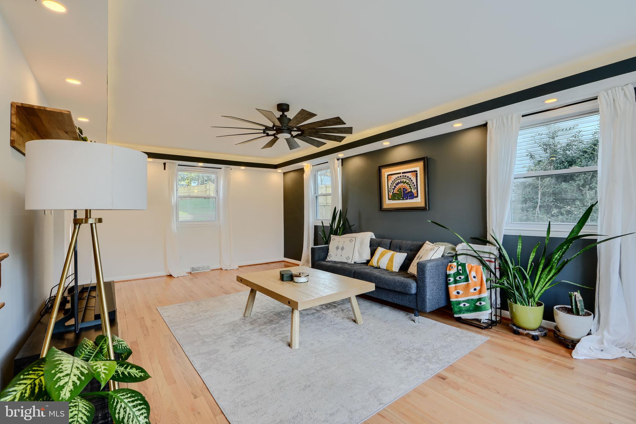 1103 Litchfield Road, Unit H Baltimore, MD 21239 - Photo 25 of 74 a living room with furniture and a large window