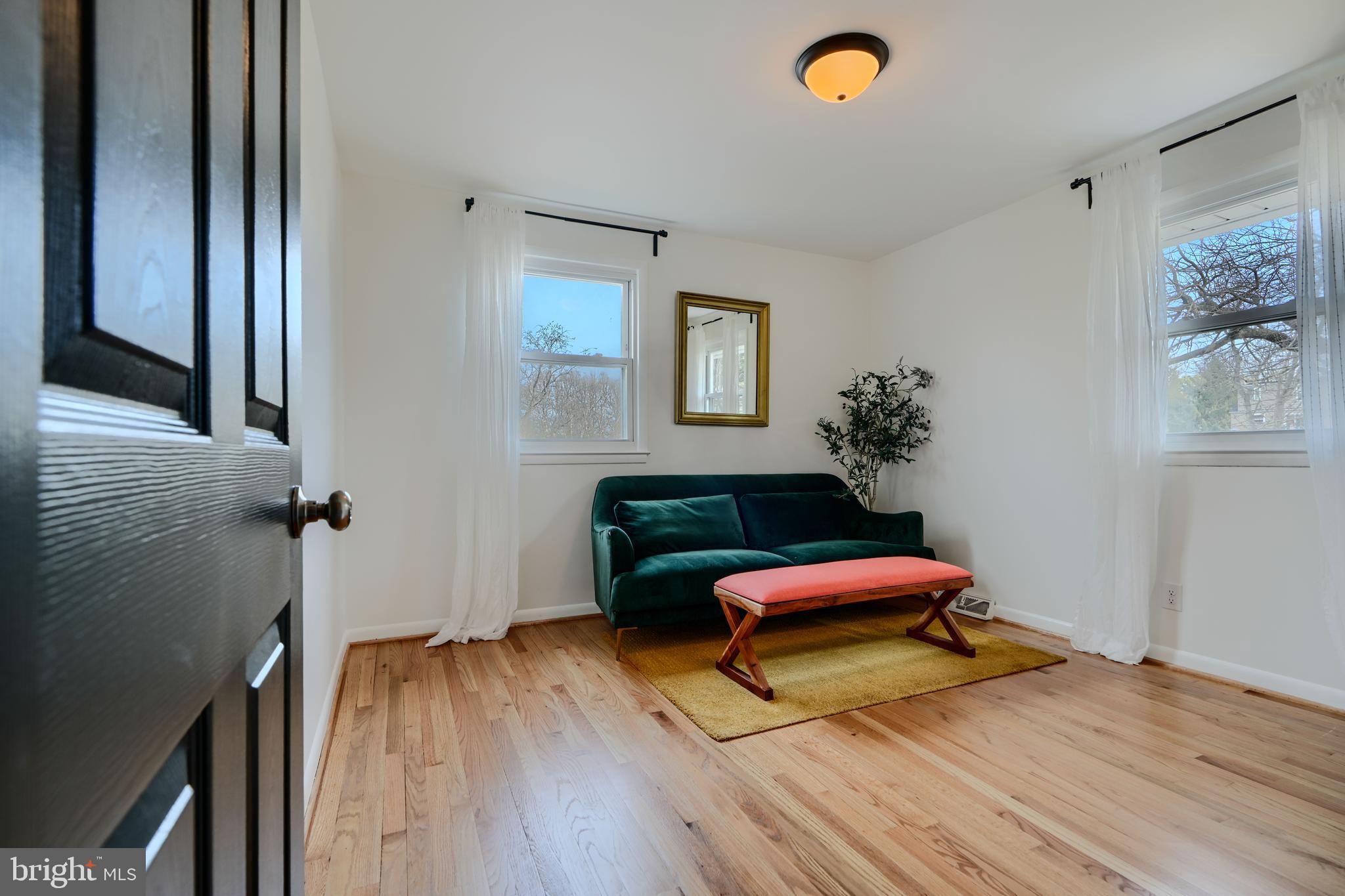 1103 Litchfield Road, Unit H Baltimore, MD 21239 - Photo 47 of 74 a bedroom with bed and window