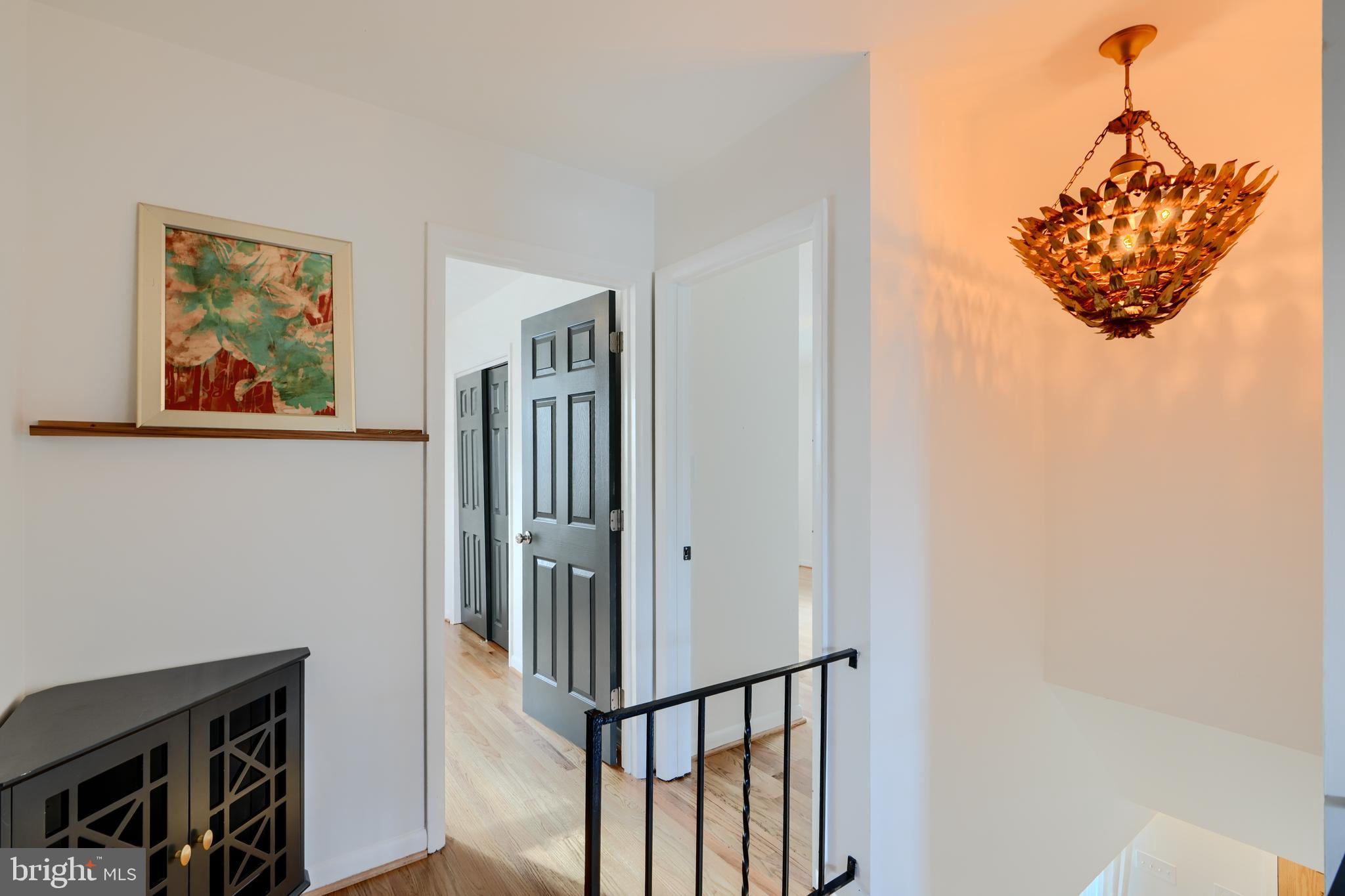 1103 Litchfield Road, Unit H Baltimore, MD 21239 - Photo 50 of 74 a view of a hallway with workspace