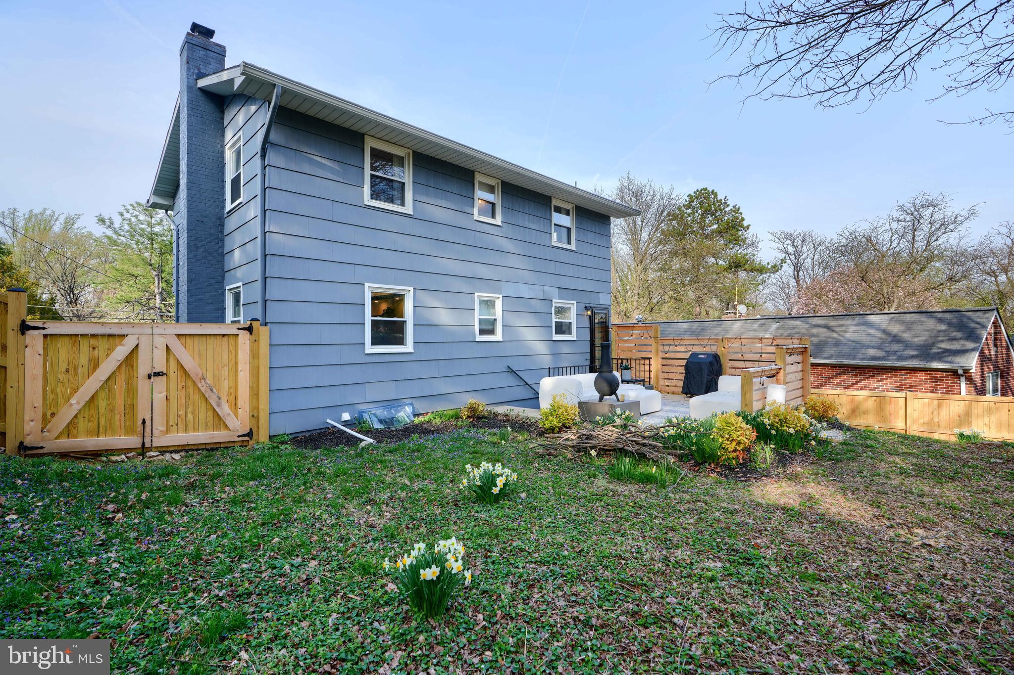 1103 Litchfield Road, Unit H Baltimore, MD 21239 - Photo 10 of 74 a front view of a house with garden
