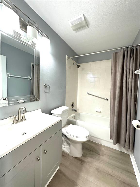 9706 Southwest 92nd Place Road Ocala, FL 34481 - Photo 21 of 82 a bathroom with a double vanity sink a mirror and a toilet