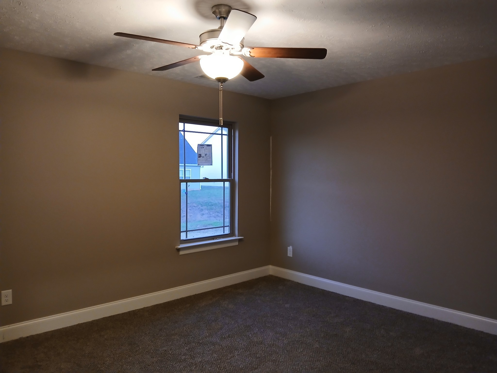 2859 Upstream Road Christiana, TN 37037 - Photo 16 of 72 an empty room with a window and a fan