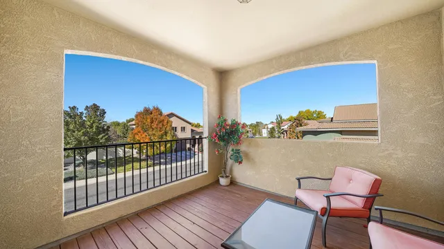 a view of a chairs in a balcony