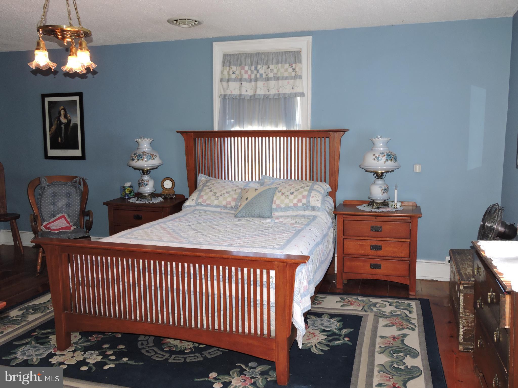 3047 Kabletown Road Charles Town, WV 25414 - Photo 17 of 30 a bedroom with a bed and a window