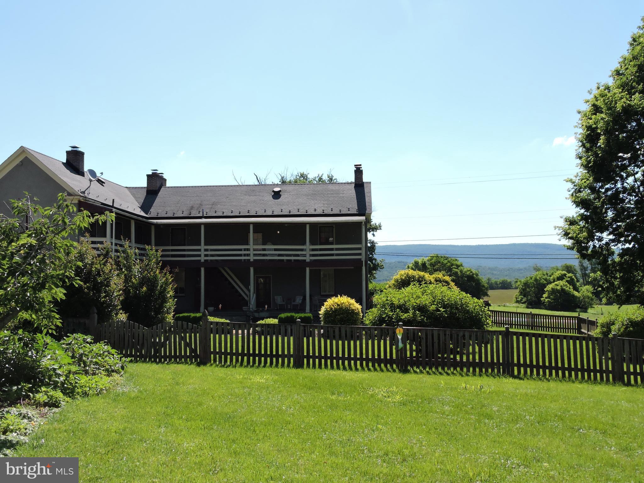 3047 Kabletown Road Charles Town, WV 25414 - Photo 3 of 30 a view of a house with a yard and plants