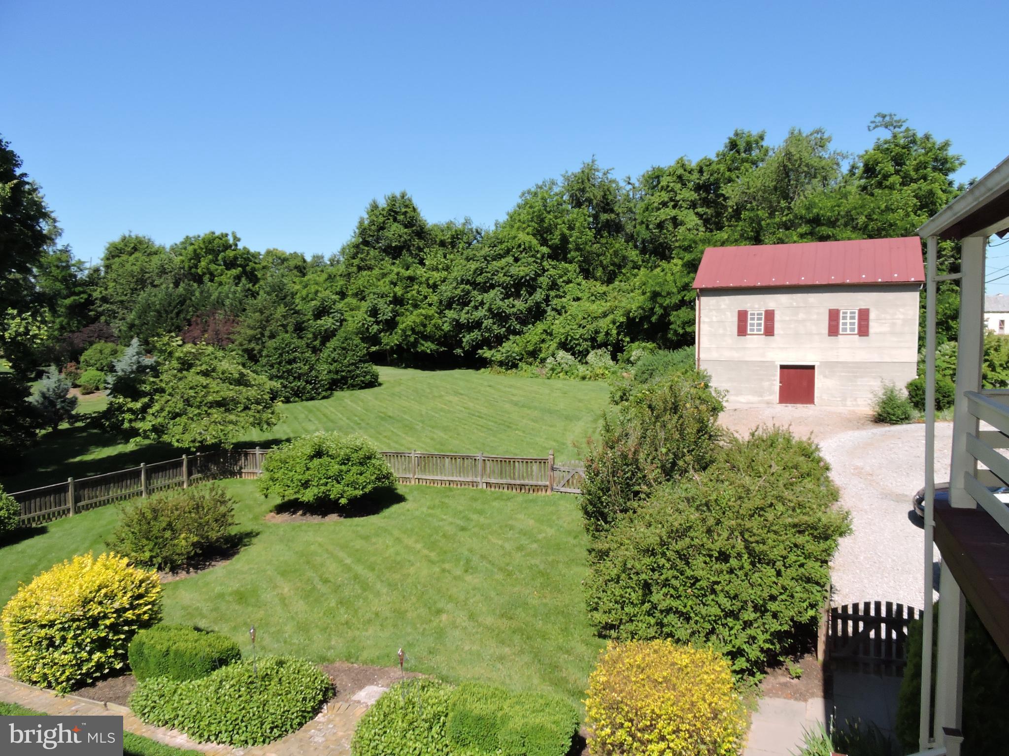 3047 Kabletown Road Charles Town, WV 25414 - Photo 24 of 30 a view of backyard with a garden and plants