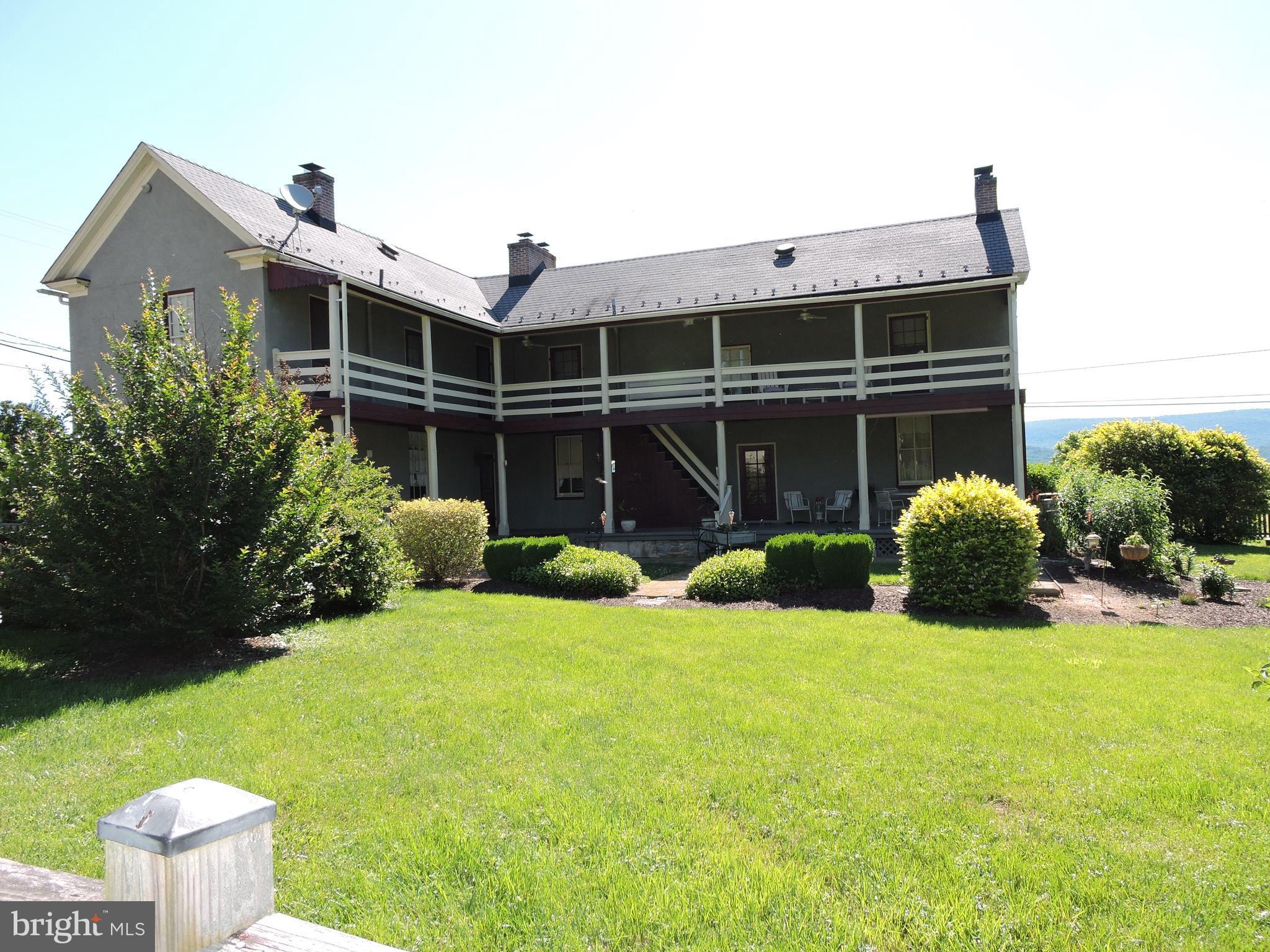 3047 Kabletown Road Charles Town, WV 25414 - Photo 29 of 30 a view of a house with a yard and a garden