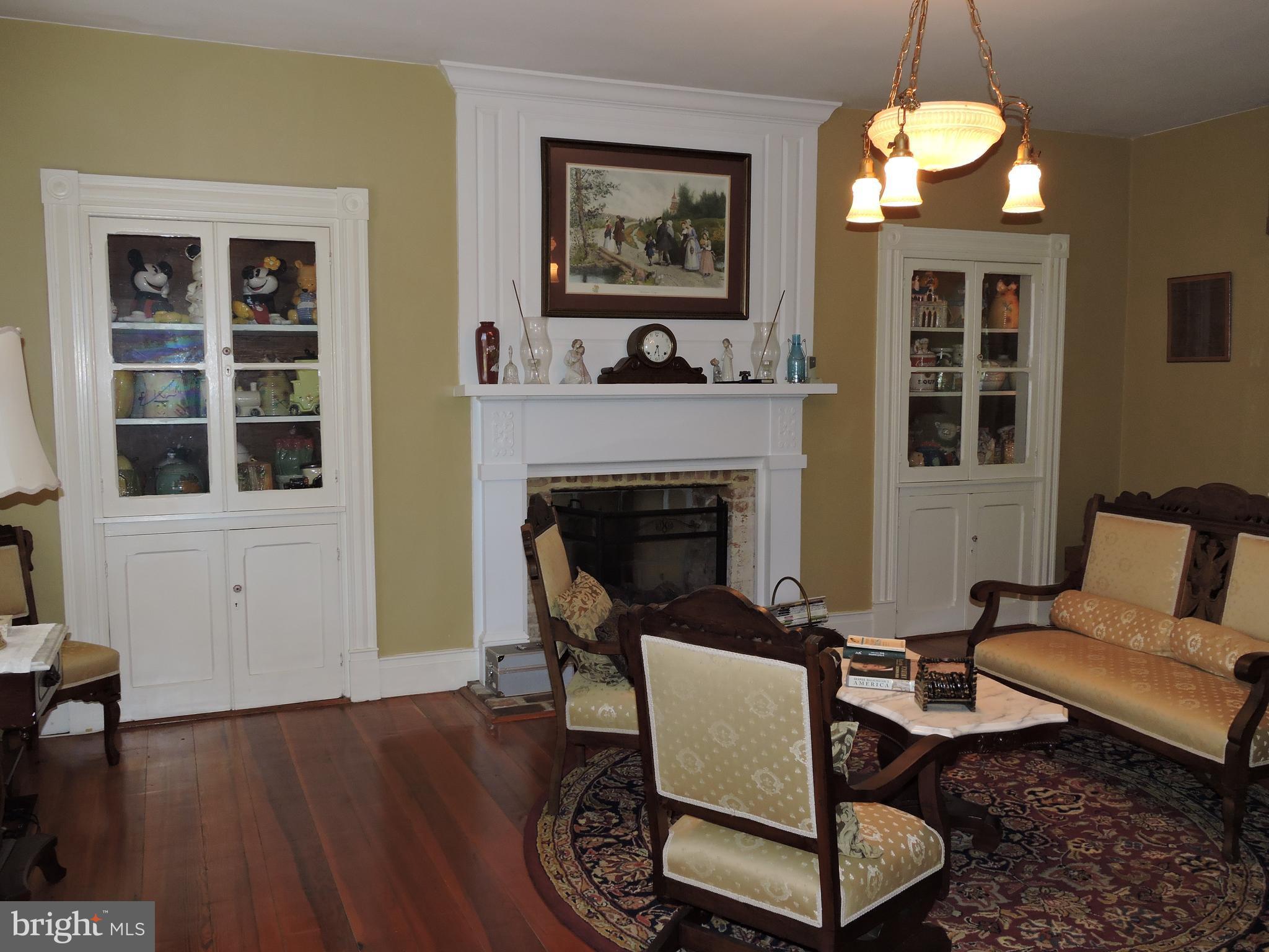 3047 Kabletown Road Charles Town, WV 25414 - Photo 7 of 30 a living room with furniture a fireplace and window