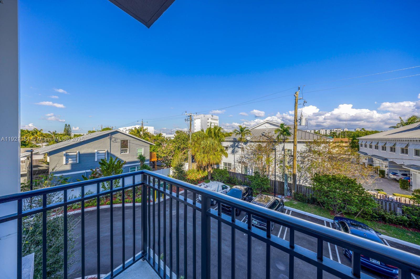 20 Northeast 19th Avenue, Unit 210 Pompano Beach, FL 33060 - Photo 11 of 18 a view of a city from a balcony