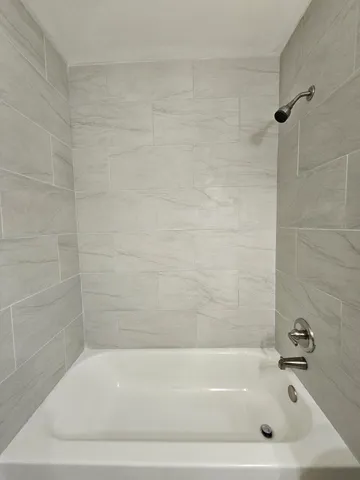 a bathroom with a bathtub
